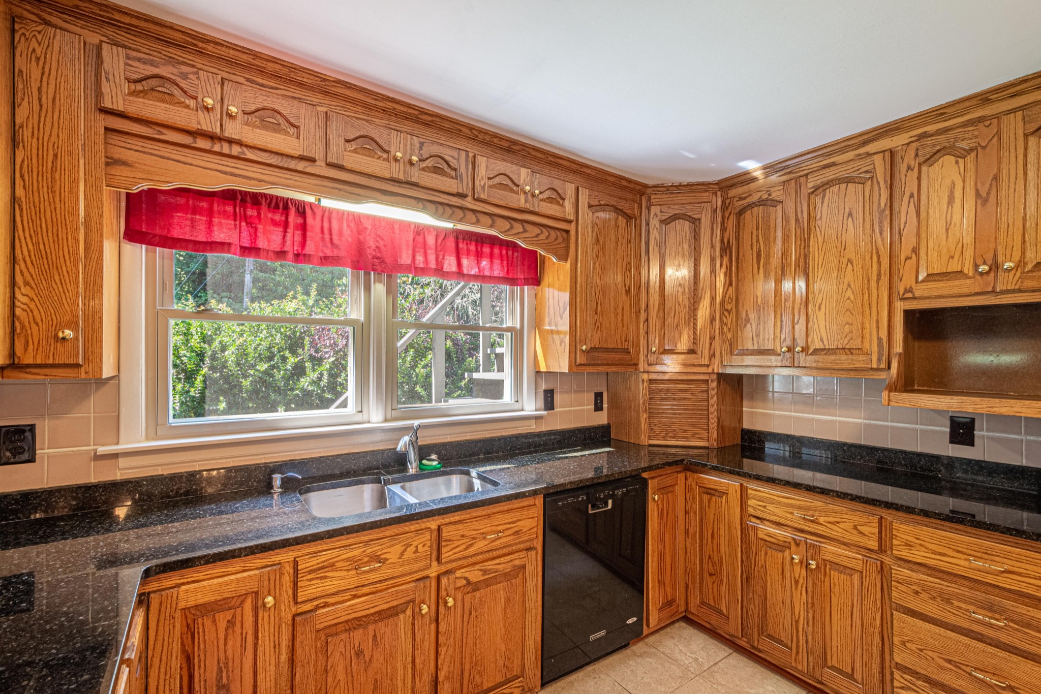 2842 Dog Branch Road Prospect, TN 38477 - Photo 10 of 50 a kitchen with stainless steel appliances granite countertop a sink and a large window