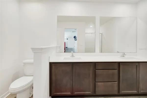 a bathroom with a sink and a toilet