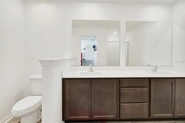 a bathroom with a sink and a toilet