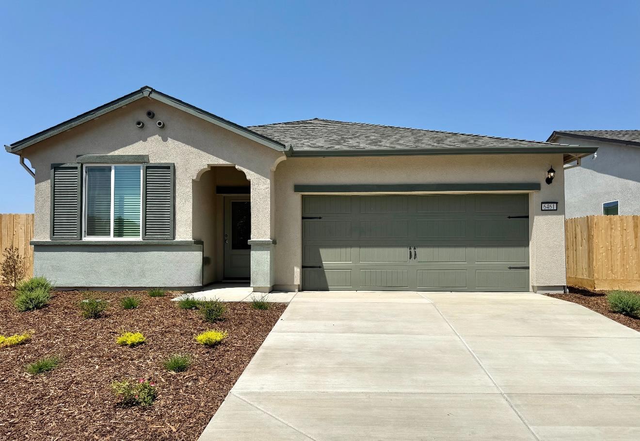 6461 Snedigar Road Riverbank, CA 95367 - Photo 1 of 1 a front view of a house with a yard