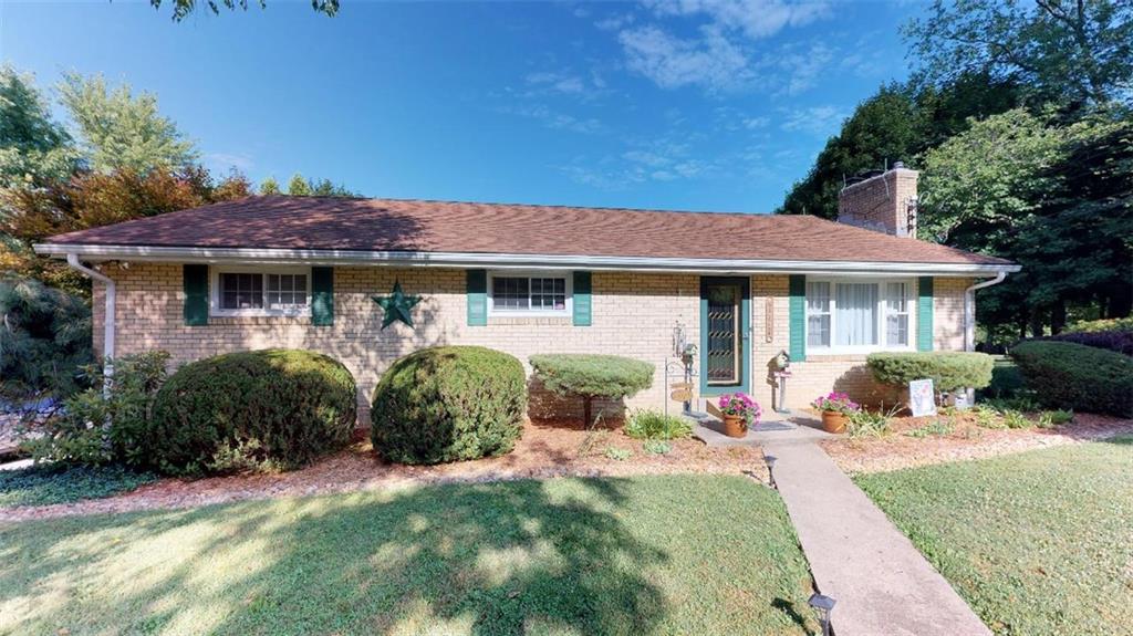 Welcome to 128 Cashdollar! Stunning Landscape, Level over an acre! 4 car Detached garage, 1 car integral, Oversized Deck and Close to major Highways, Shopping, Entertainment and so much more!! 