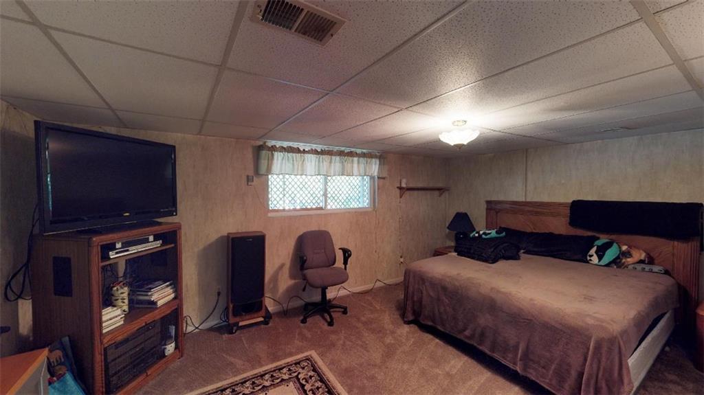 128 Cashdollar Road Mars, PA 16046 - Photo 22 of 24 Very Large LL bedroom! Lower level features a full bath, oversized Laundry, family Room and Plenty of Storage!