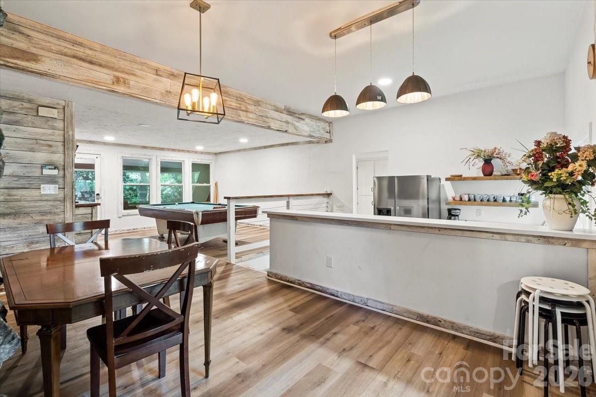 1715 Union Road Matthews, NC 28104 - Photo 14 of 41 a view of a dining room with furniture and a chandelier