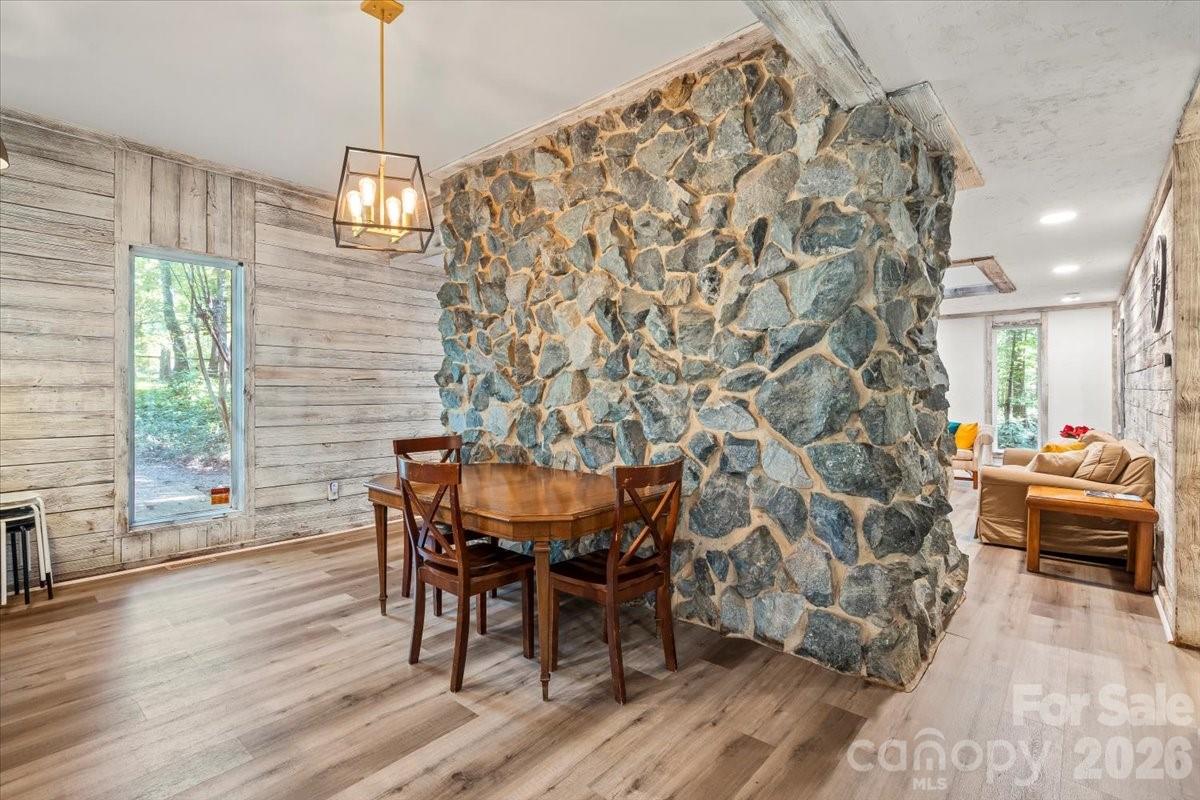 1715 Union Road Matthews, NC 28104 - Photo 15 of 41 a view of a dining room with furniture and wooden floor