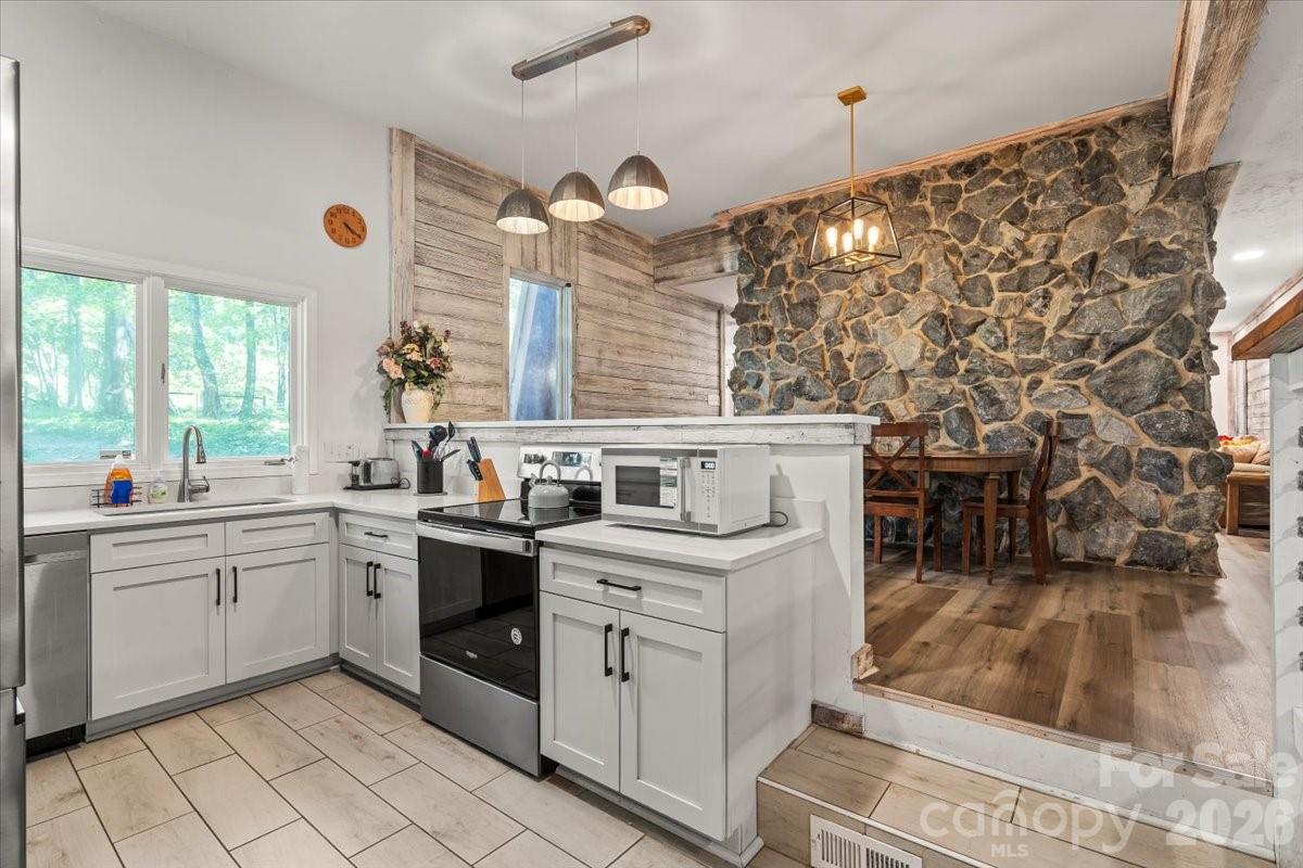 1715 Union Road Matthews, NC 28104 - Photo 16 of 41 a kitchen with cabinets and window