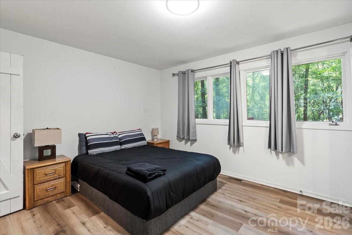 1715 Union Road Matthews, NC 28104 - Photo 20 of 41 a bedroom with a bed and a window