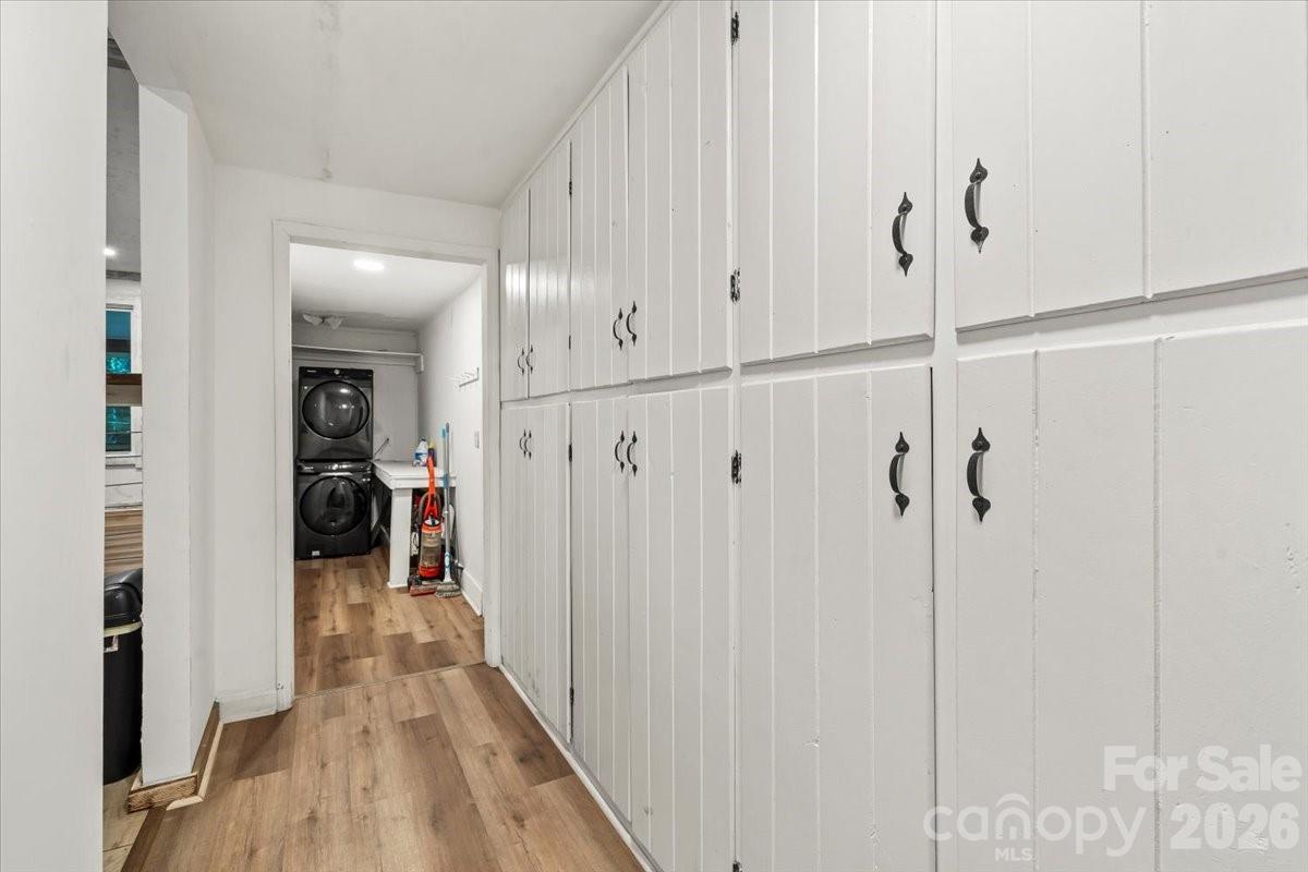 1715 Union Road Matthews, NC 28104 - Photo 21 of 41 a view of a hallway with wooden floor and closet area