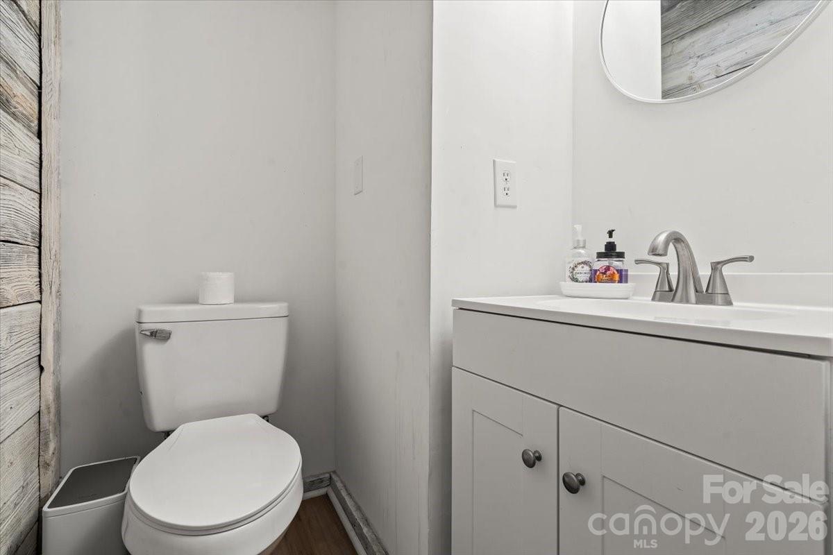 1715 Union Road Matthews, NC 28104 - Photo 25 of 41 a bathroom with a toilet sink and mirror