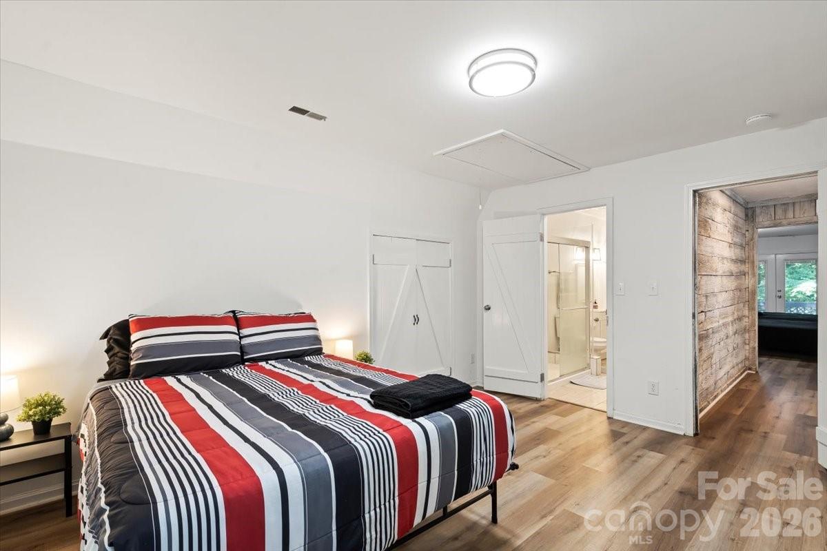 1715 Union Road Matthews, NC 28104 - Photo 26 of 41 a bedroom with a bed and a closet