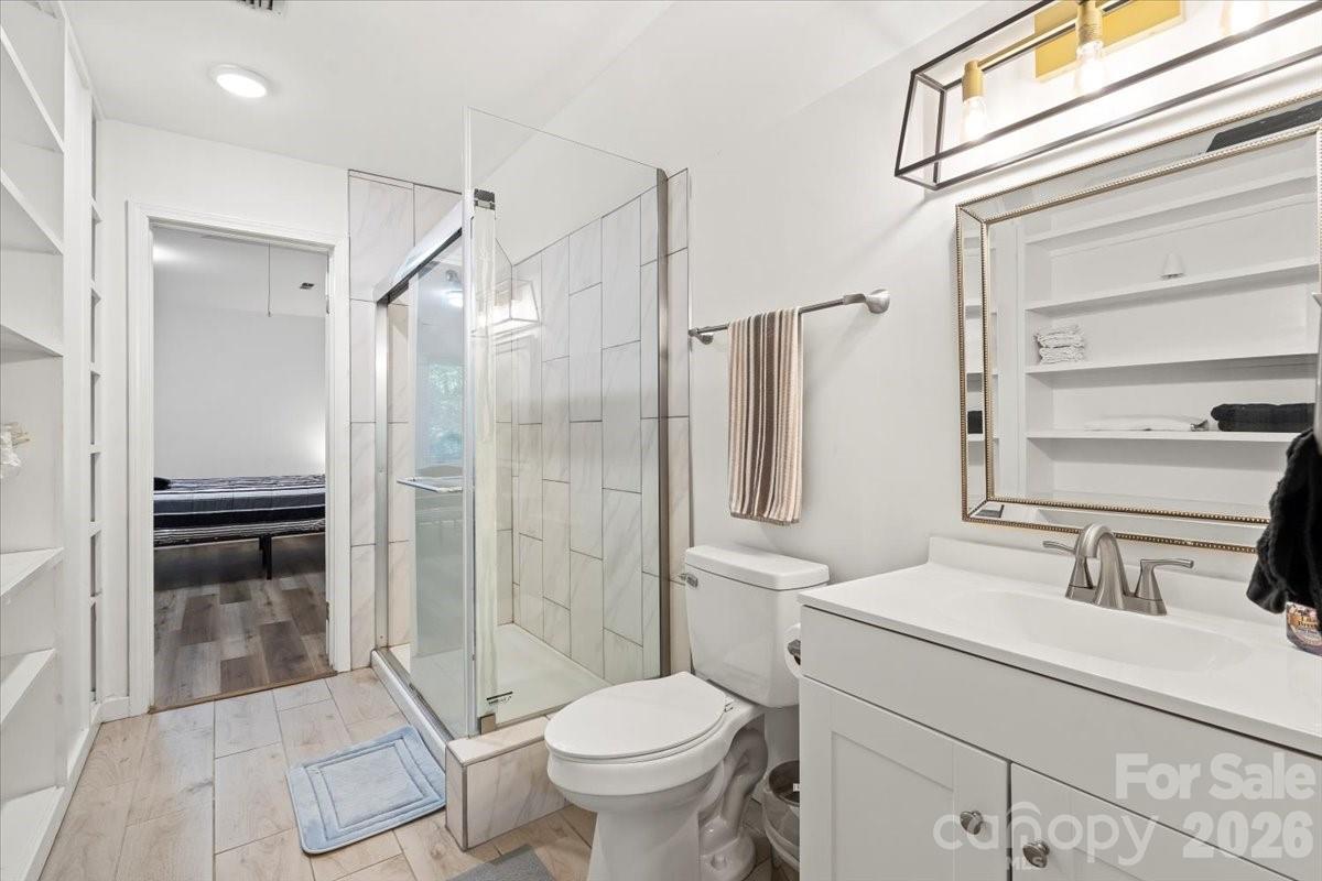 1715 Union Road Matthews, NC 28104 - Photo 28 of 41 a bathroom with a sink toilet and shower