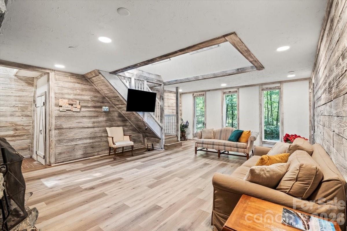 1715 Union Road Matthews, NC 28104 - Photo 9 of 41 a living room with furniture and a flat screen tv