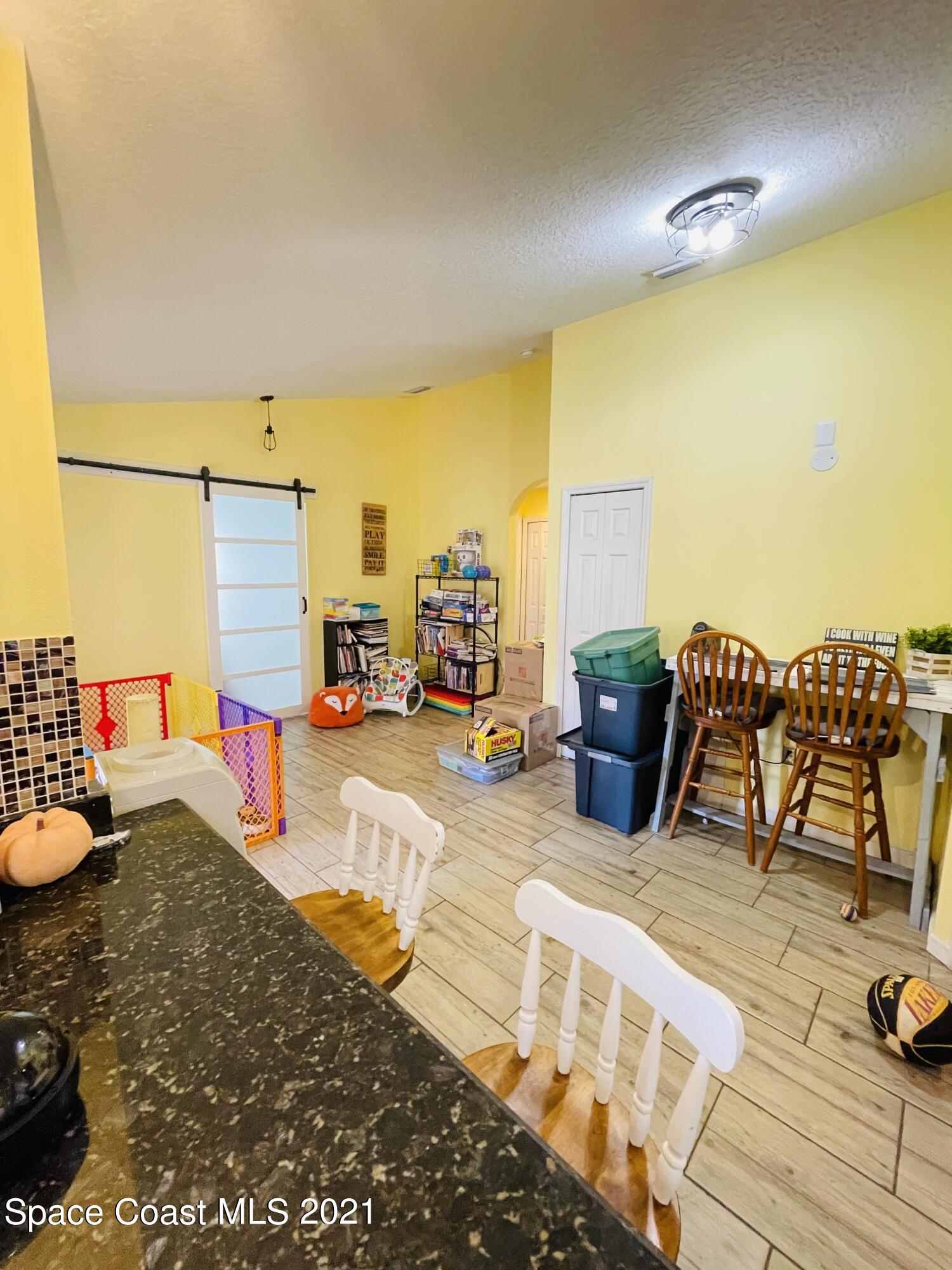 2374 Angel Road Palm Bay, FL 32909 - Photo 8 of 19 a living room with furniture