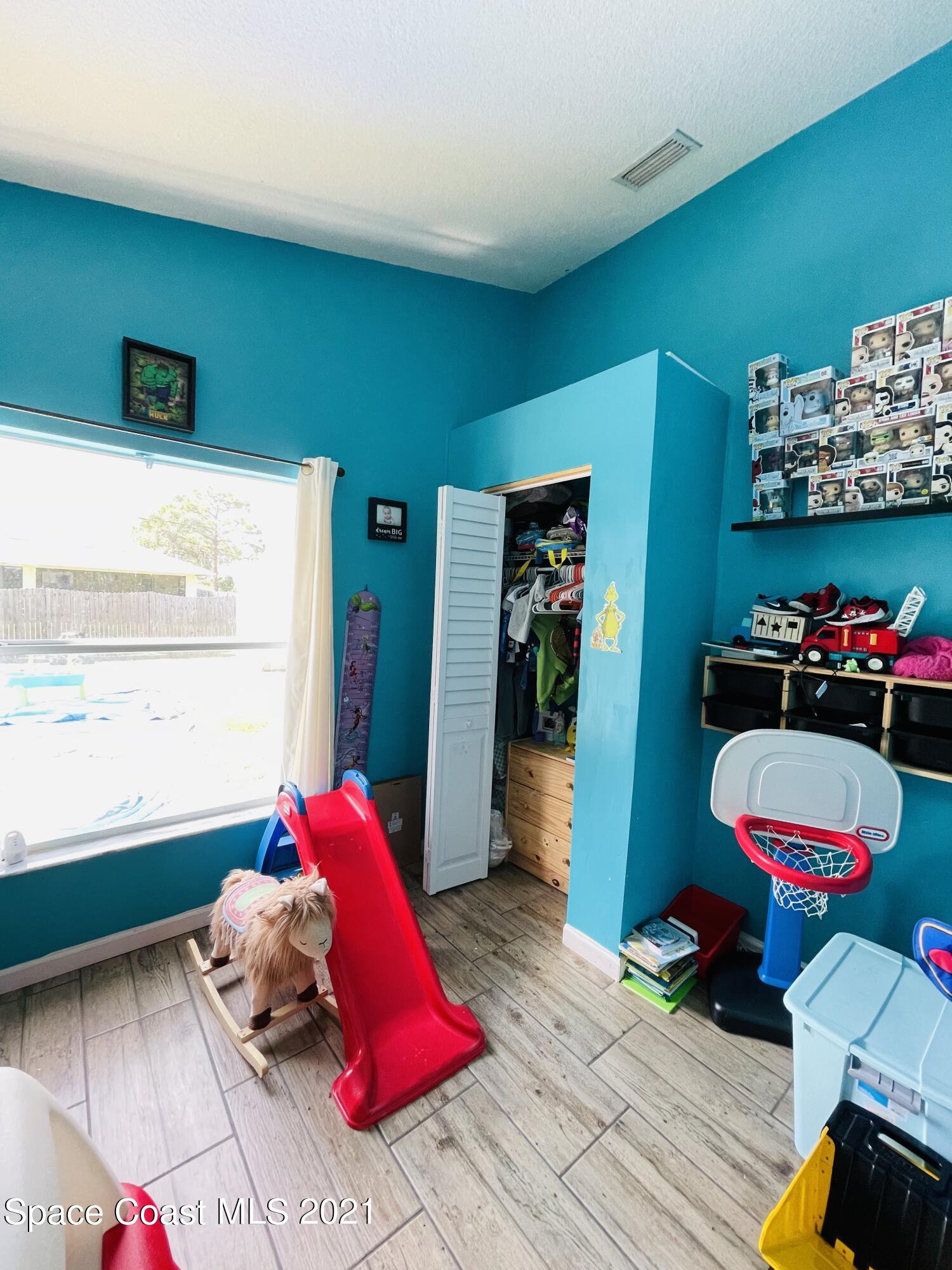 2374 Angel Road Palm Bay, FL 32909 - Photo 10 of 19 a view of a dining room with furniture and window