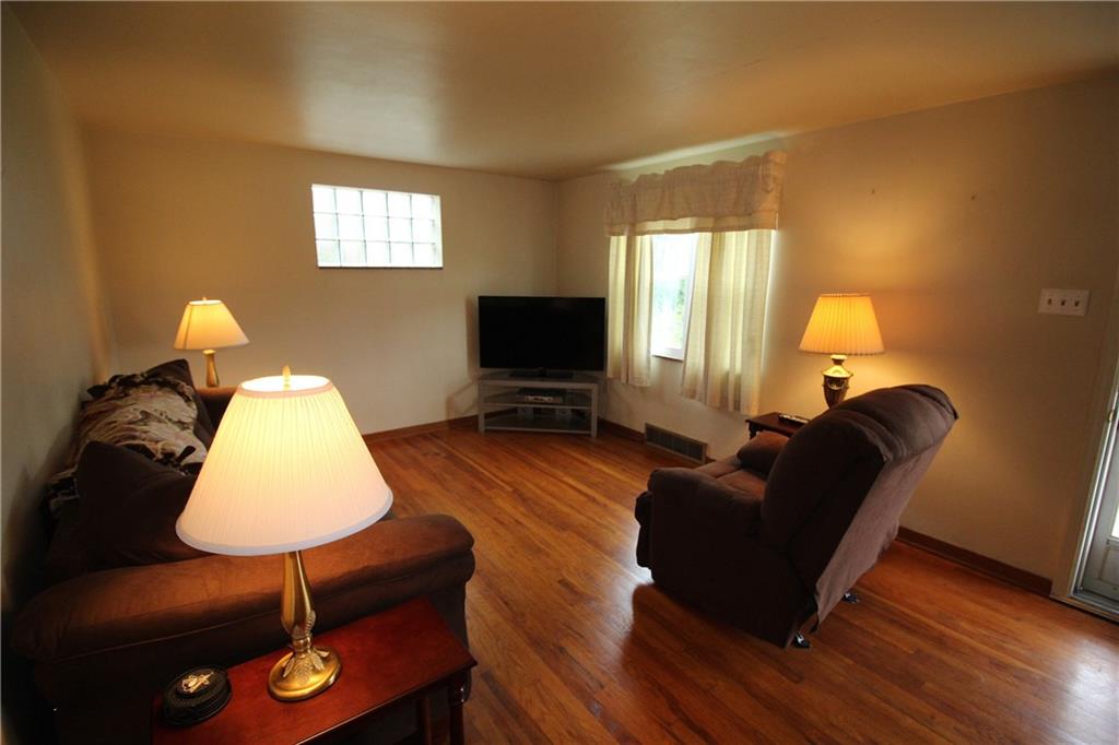 1331 Hamilton Road Castle Shannon, PA 15234 - Photo 2 of 17 Living room has exposed hardwood flooring.