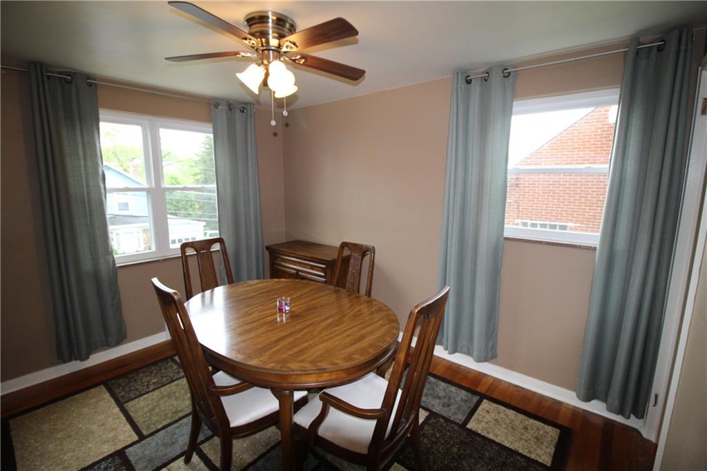 1331 Hamilton Road Castle Shannon, PA 15234 - Photo 5 of 17 Dining room also has exposed wood floors and a ceiling fan.