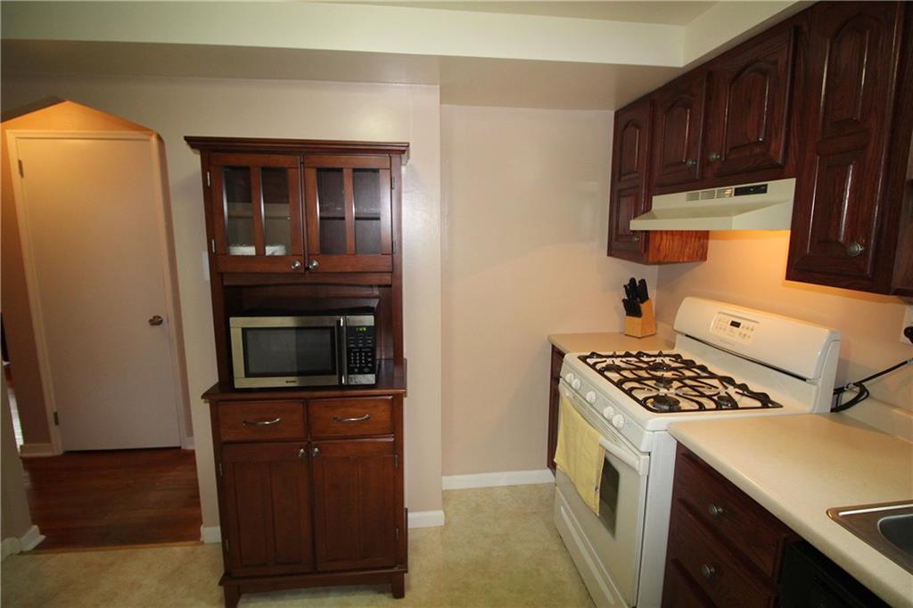1331 Hamilton Road Castle Shannon, PA 15234 - Photo 9 of 17 The kitchen includes the gas range, refrigerator, and dishwasher.