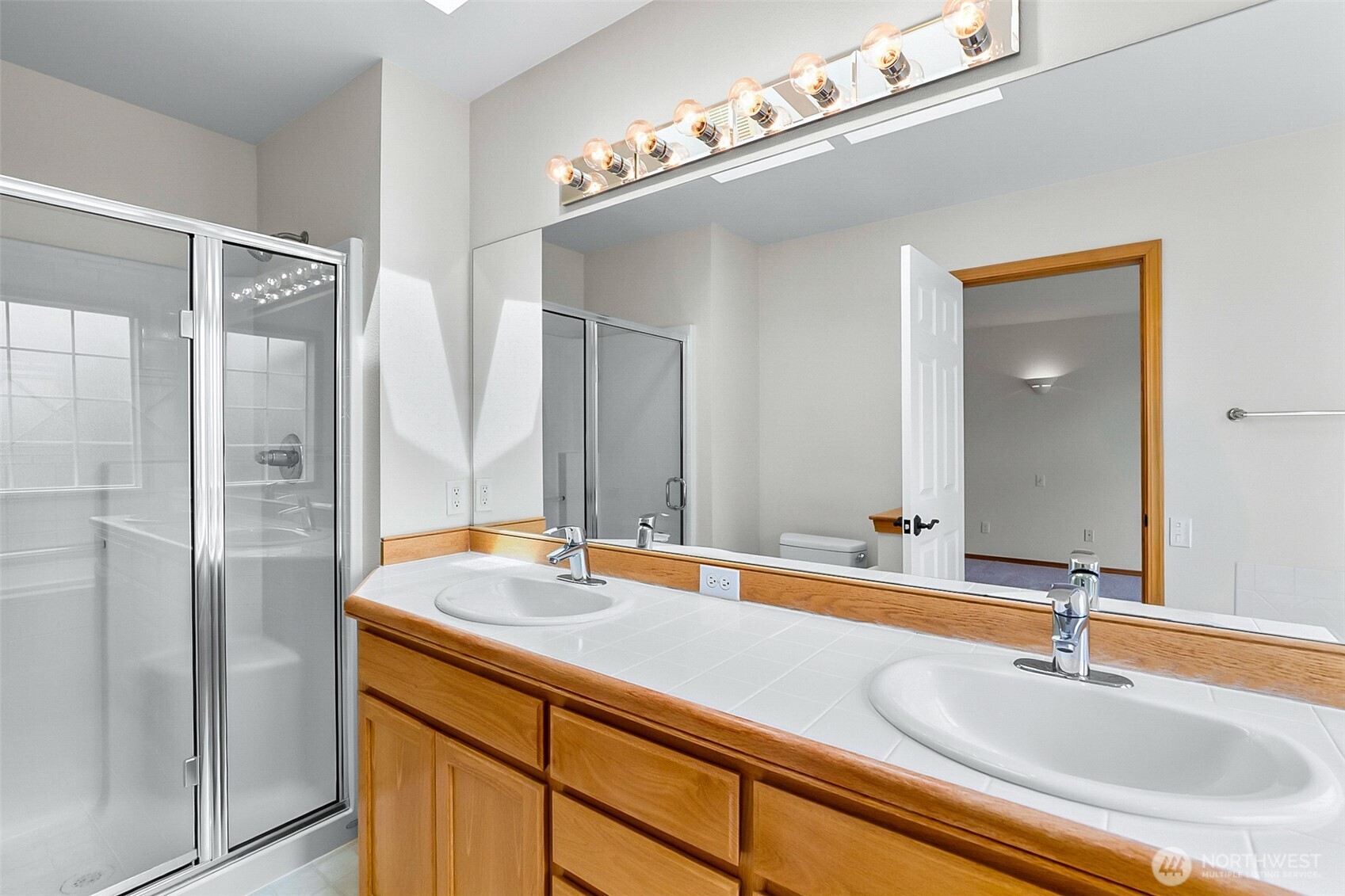 18410 11th Drive Southeast Bothell, WA 98012 - Photo 33 of 40 a bathroom with a sink and a mirror