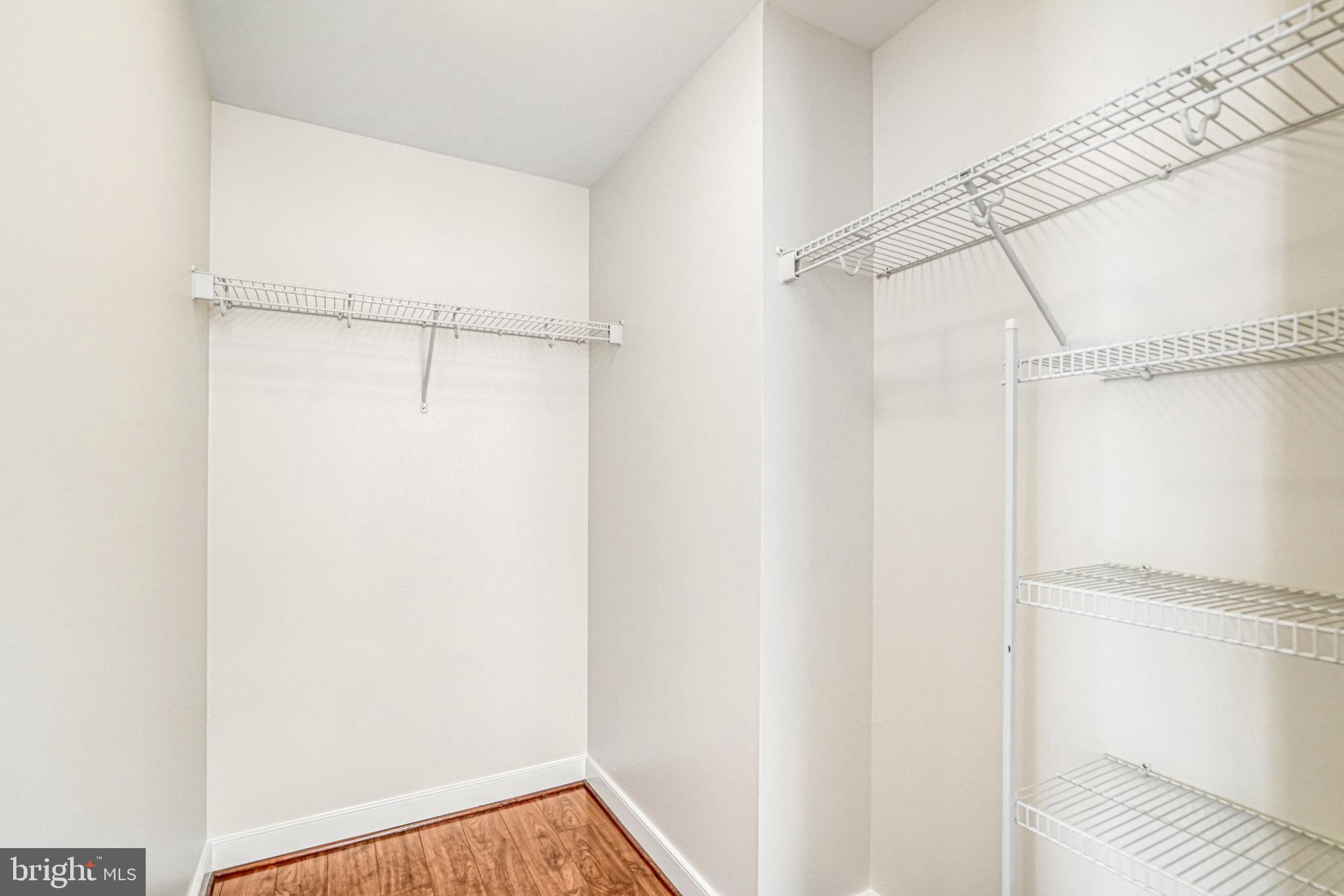 820 North Pollard Street, Unit 915 Arlington, VA 22203 - Photo 20 of 30 a view of a room with racks on the wall
