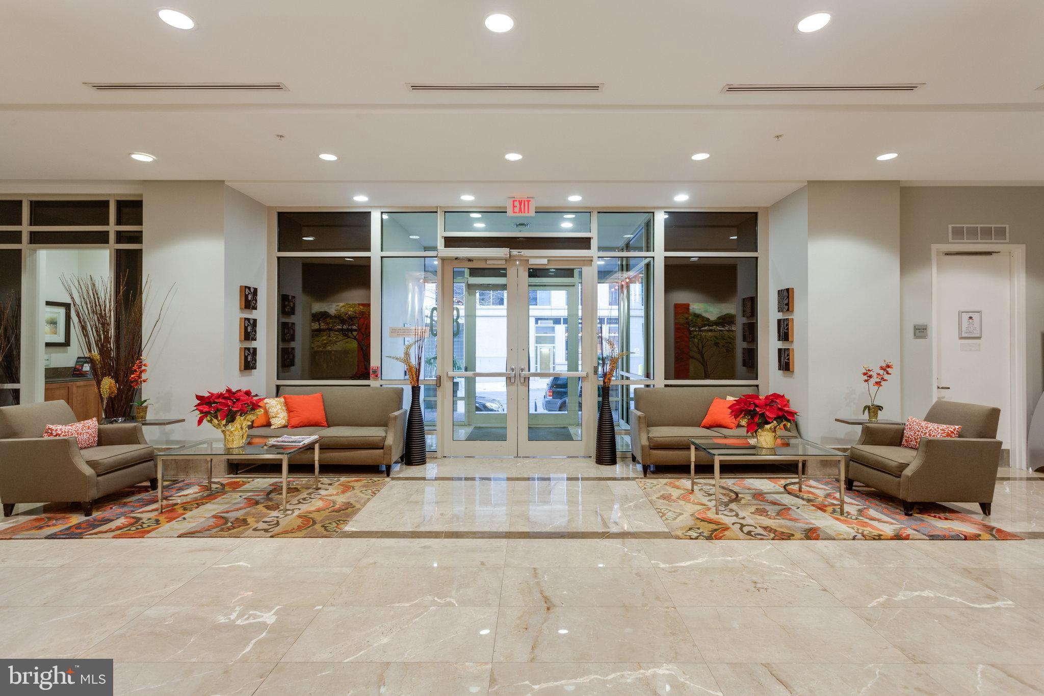 820 North Pollard Street, Unit 915 Arlington, VA 22203 - Photo 26 of 30 a living room with furniture and window
