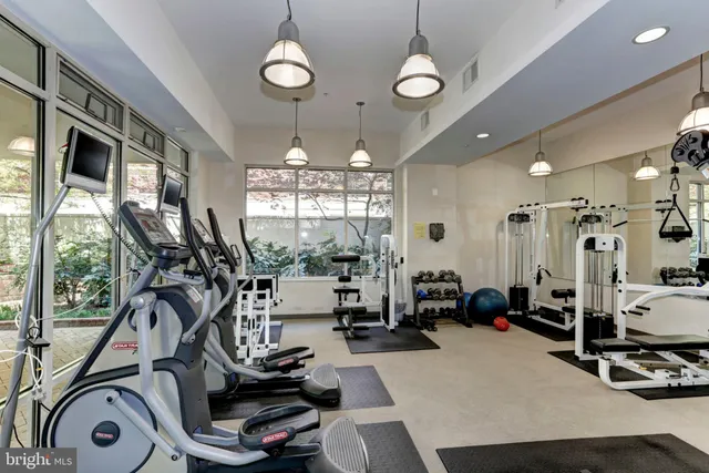 a living room with furniture and window