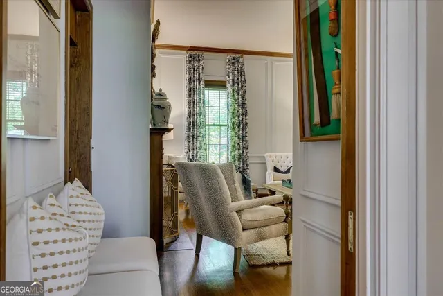 a large kitchen with a table and chairs in it