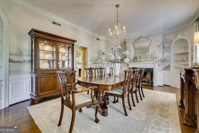 a bathroom with a double vanity sink mirror and bathtub
