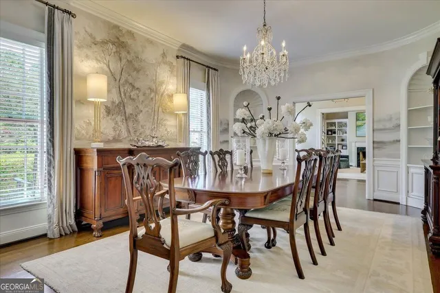 a bathroom with a double vanity sink mirror and shower