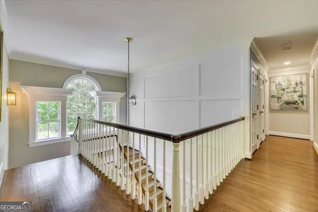 a spacious bedroom with a bed and a couch