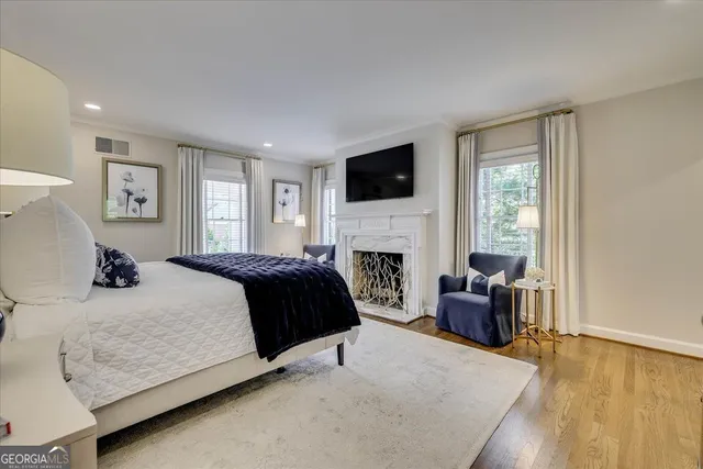 a bathroom with a toilet a sink and a mirror