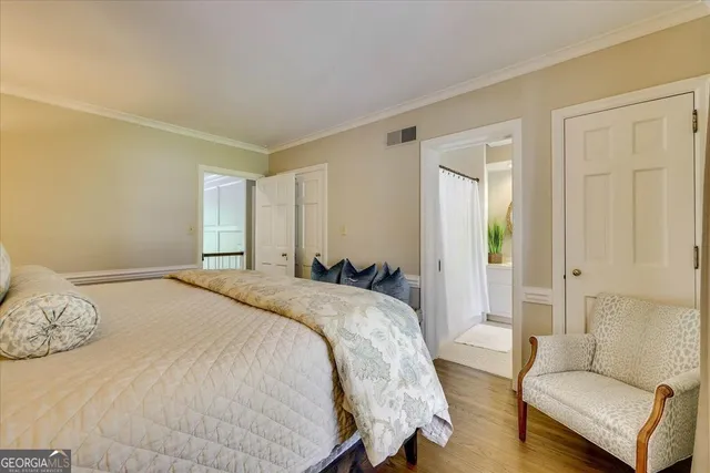 a kitchen with a stove a sink and a window