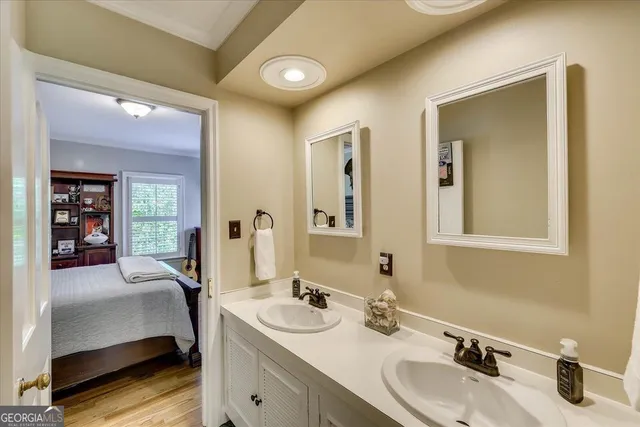 a living room filled with furniture and a large window