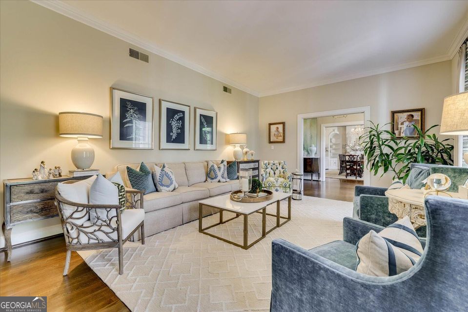 5 Prather Woods Lane Augusta, GA 30909 - Photo 10 of 73 a living room with furniture and a lamp