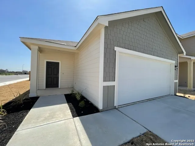 a house view with a outdoor space