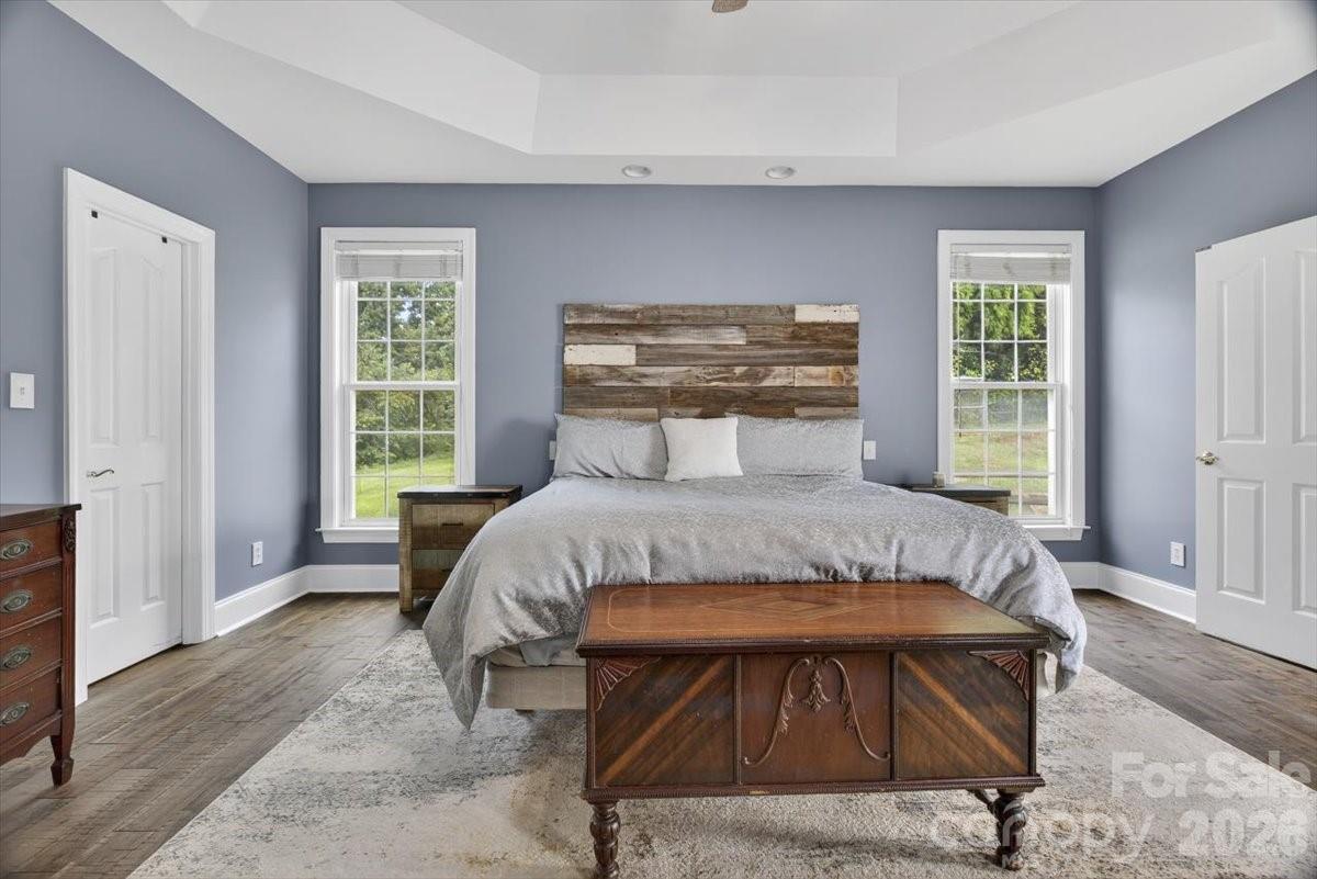 498 Johnson Dairy Road Mooresville, NC 28115 - Photo 21 of 43 a bedroom with a bed and window