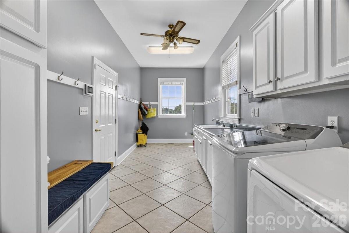 498 Johnson Dairy Road Mooresville, NC 28115 - Photo 26 of 43 a kitchen that has a sink cabinets and stainless steel appliances