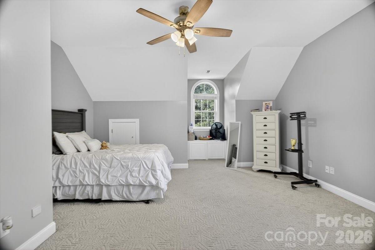498 Johnson Dairy Road Mooresville, NC 28115 - Photo 32 of 43 a bedroom with bed and window