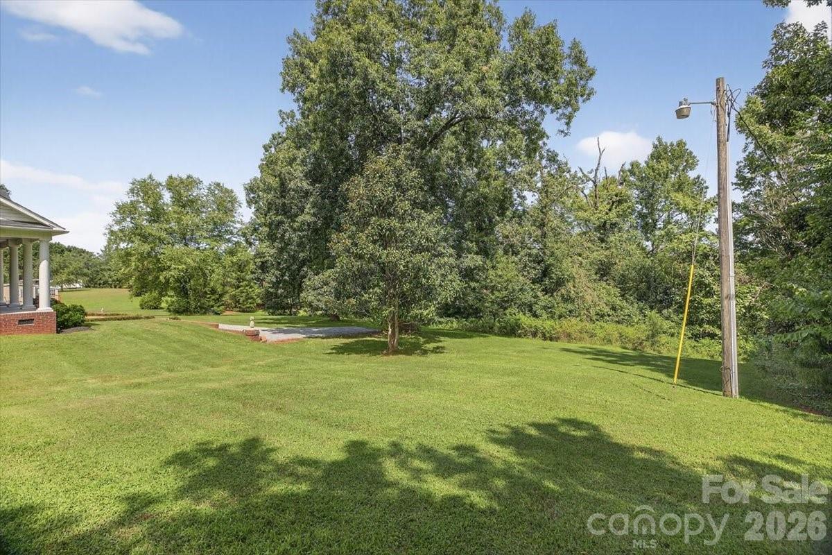 498 Johnson Dairy Road Mooresville, NC 28115 - Photo 39 of 43 a view of a trees in a yard