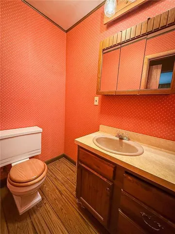 a large bedroom with a large bed and large window