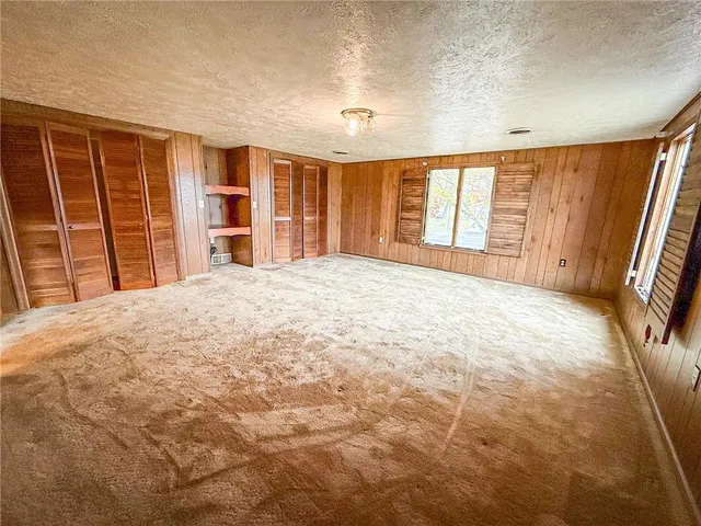 a bathroom with a sink a mirror and a bathtub