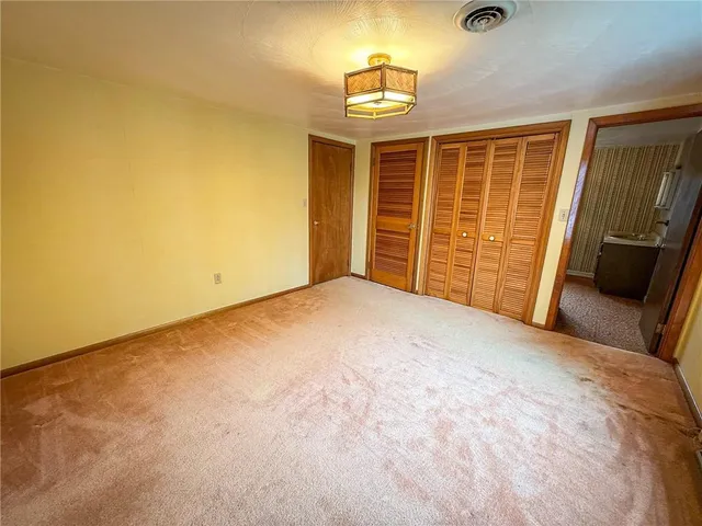 a bathroom with a tub and a shower