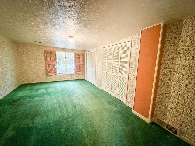 a view of an empty room with window