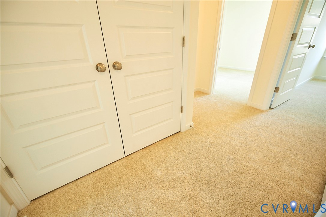 214 Greenpark Road Sandston, VA 23150 - Photo 18 of 50 Hall featuring light colored carpet and baseboards