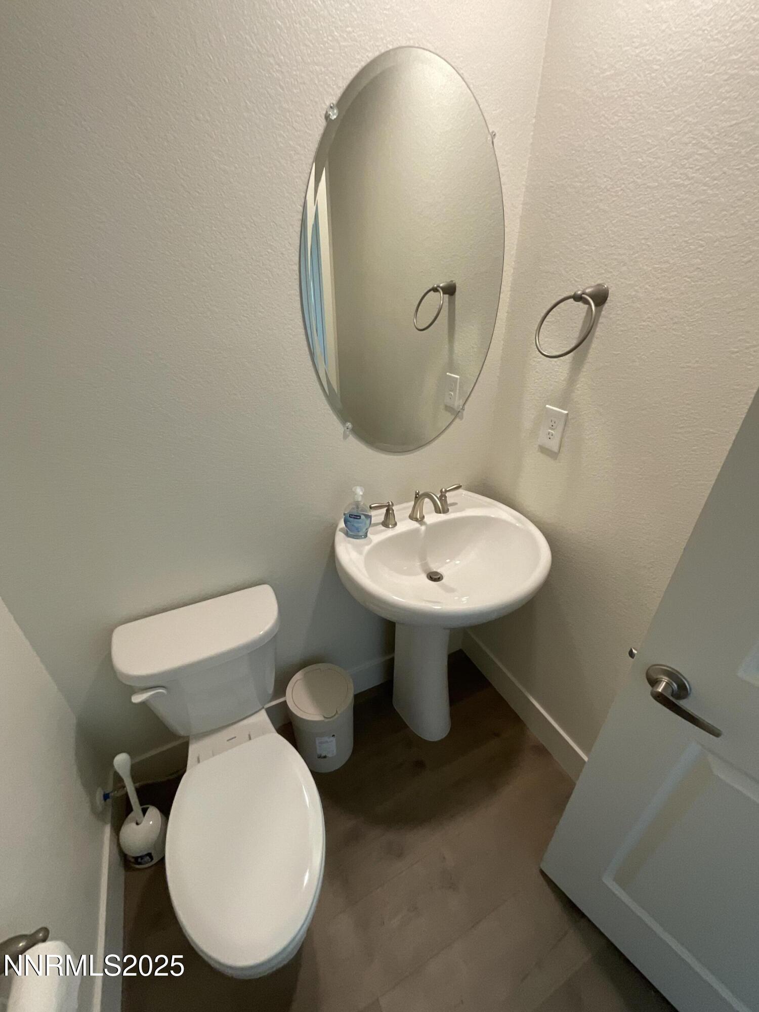 4128 Scenic Drive Reno, NV 89523 - Photo 8 of 20 a bathroom with a toilet sink and mirror