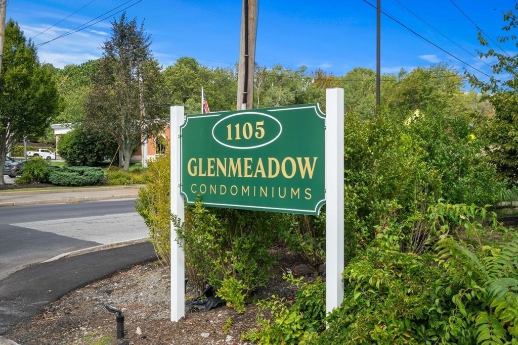 1105 Lexington Street, Unit 84 Waltham, MA 02452 - Photo 1 of 9 a sign on the side of a road