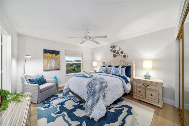 a bedroom with a bed and a couch