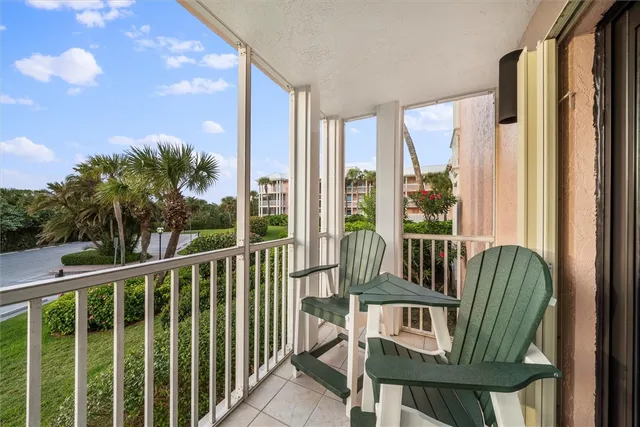 a view of balcony with outdoor seating