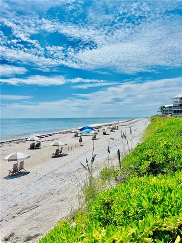 a view of beach and ocean