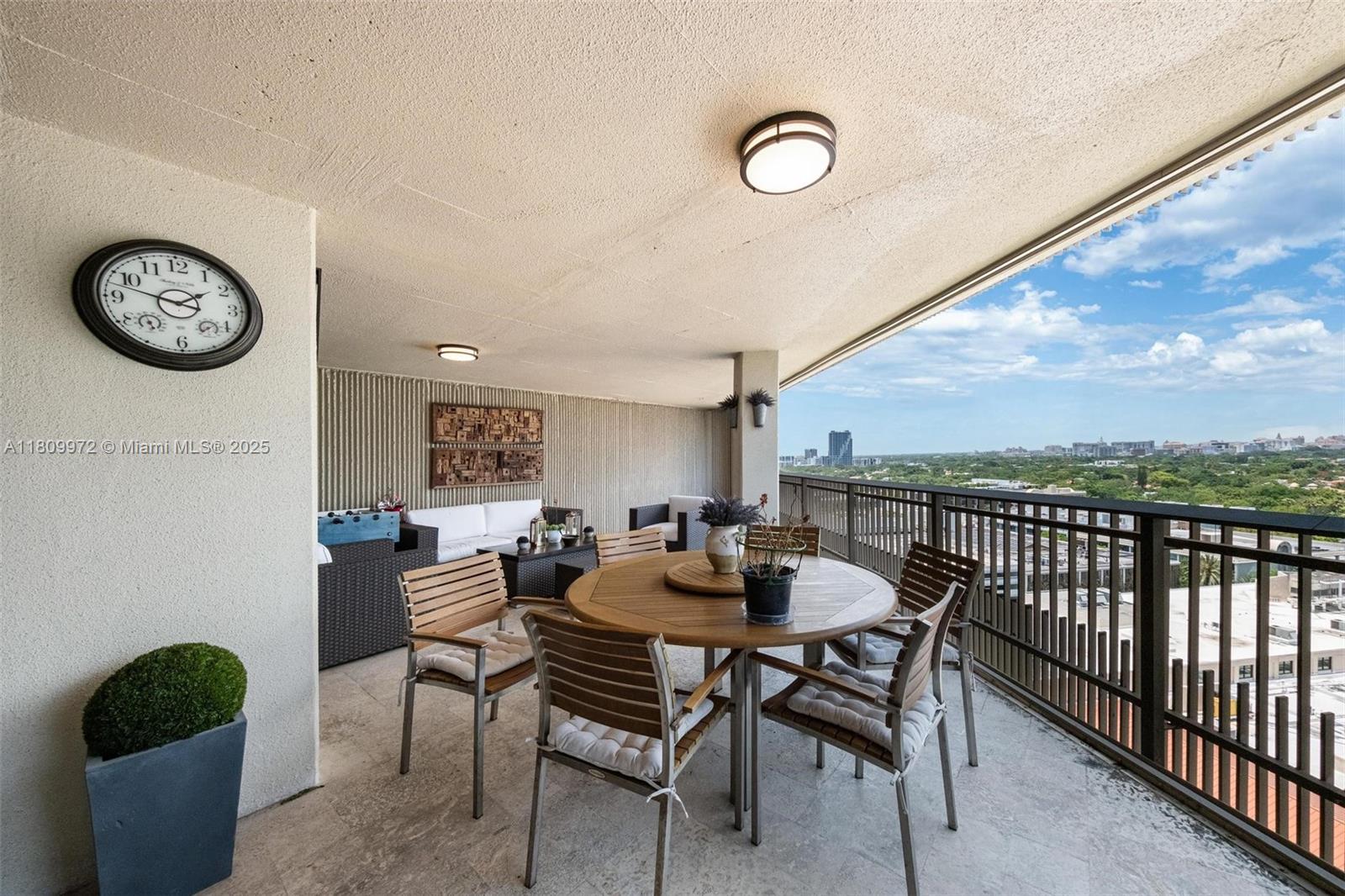 2901 South Bayshore Drive, Unit 17G/H Miami, FL 33133 - Photo 19 of 81 a dining room with furniture and a large window