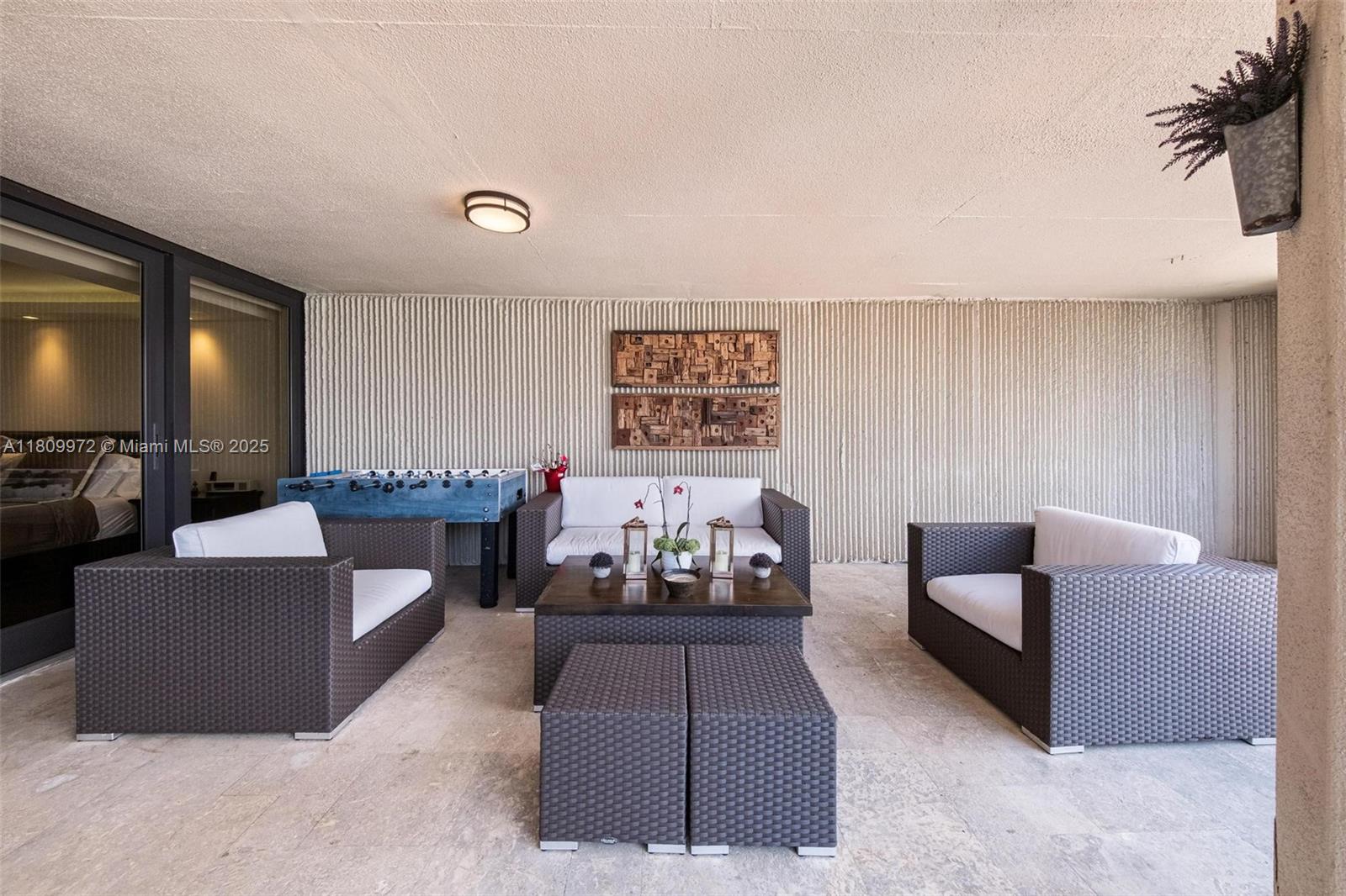 2901 South Bayshore Drive, Unit 17G/H Miami, FL 33133 - Photo 20 of 81 a living room with furniture and a potted plant