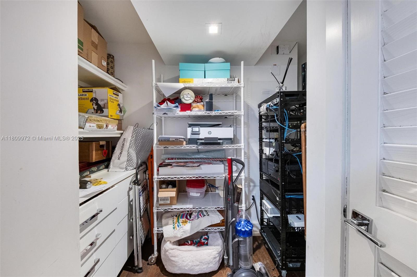 2901 South Bayshore Drive, Unit 17G/H Miami, FL 33133 - Photo 36 of 81 a kitchen with stainless steel appliances a refrigerator and a stove